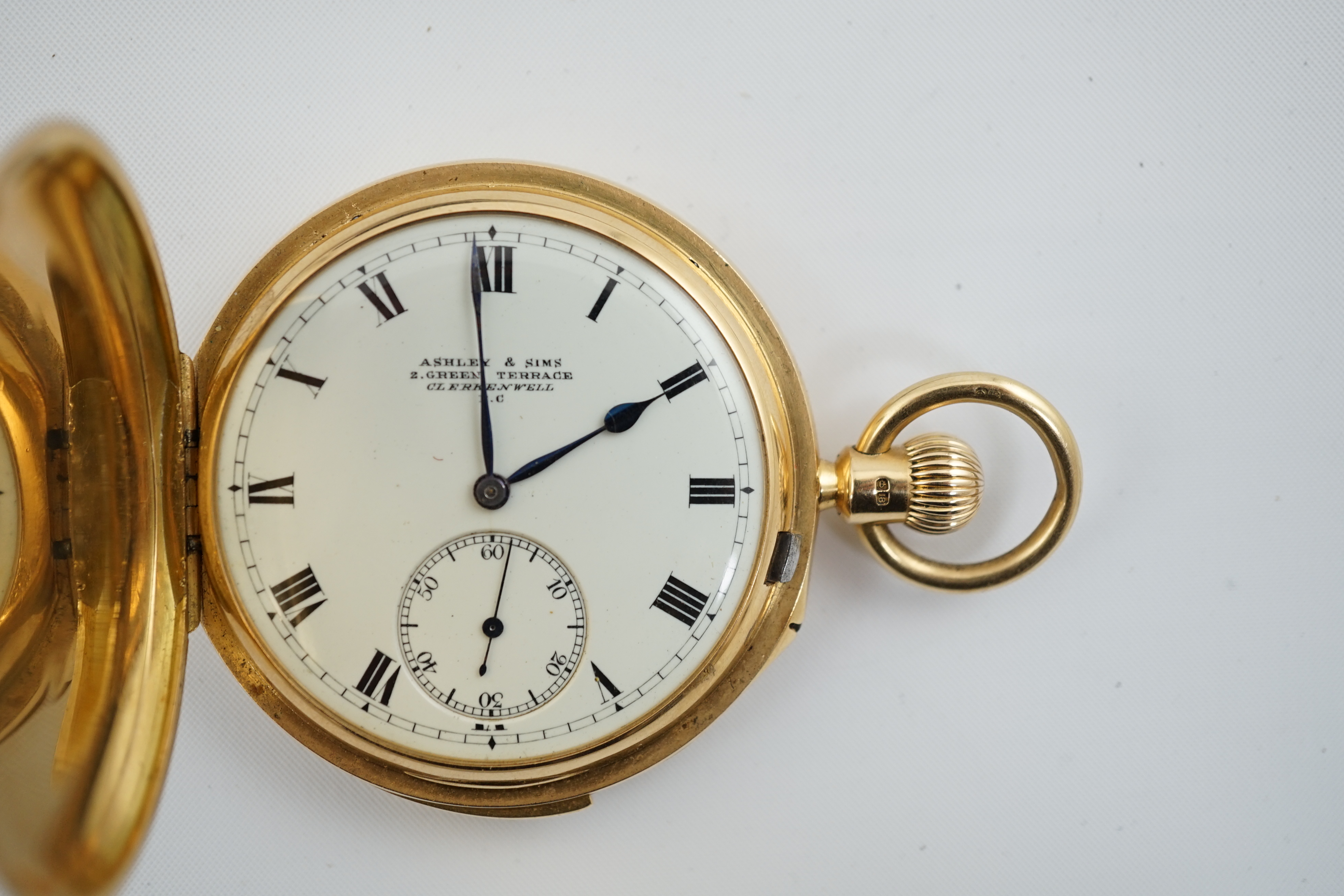 A George V 18ct gold hunter minute repeating lever pocket watch, by Ashley & Sims of Clerkenwell